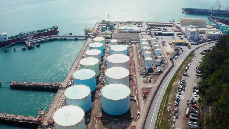 View of tank with oil refinery and petrochemical industrial plant